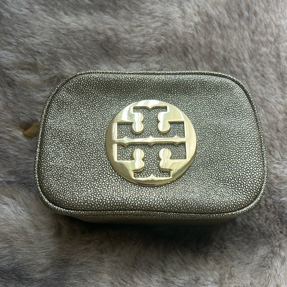 Tory Burch metallic finish pouch with Phone. TB GOLD logo medallion